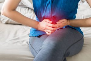 Candida fájdalmat kiváltó tüneteivel küzdő nő